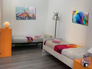 A bed or beds in a room at Casa Julka