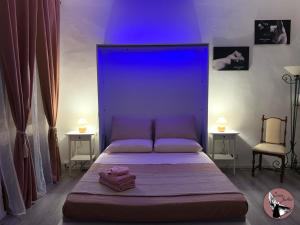 A bed or beds in a room at Casa Julka