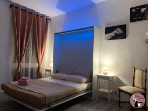 A bed or beds in a room at Casa Julka