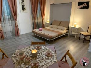 A bed or beds in a room at Casa Julka