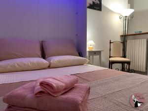 A bed or beds in a room at Casa Julka