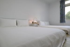 Katil atau katil-katil dalam bilik di Party& Dream Homestay