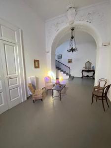 Posedenie v ubytovaní Palazzo Bonaventura 1906