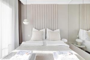 Ένα ή περισσότερα κρεβάτια σε δωμάτιο στο GREAT Residence +26 φωτογραφίες