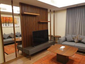 Televisyen dan/atau pusat hiburan di Terminal Inn Al Mansoura