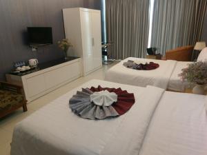 A bed or beds in a room at Vân Anh Luxury