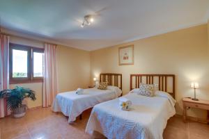 Postel nebo postele na pokoji v ubytování Ideal Property Mallorca - Can Bielo