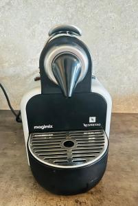 a toaster sitting on top of a table at White Pearl Studio with parking in Holešovice in Prague