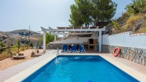 The swimming pool at or close to Cortijo Rural Claudia Taberno by Ruralidays