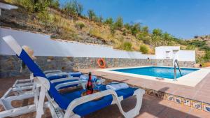The swimming pool at or close to Cortijo Rural Claudia Taberno by Ruralidays