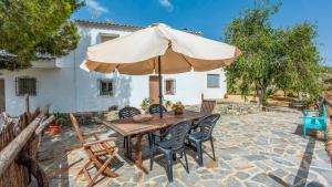 A garden outside Cortijo Rural Claudia Taberno by Ruralidays