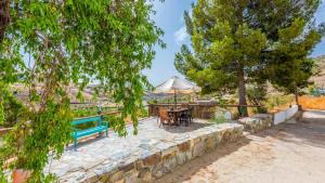 A garden outside Cortijo Rural Claudia Taberno by Ruralidays