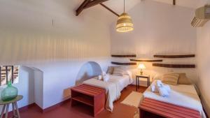 Posteľ alebo postele v izbe v ubytovaní Finca Buytrón Montilla by Ruralidays