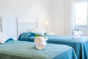 Postel nebo postele na pokoji v ubytování Ideal Property Mallorca - Villa Encantada