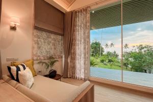 Balkón nebo terasa v ubytování Shantaa Resort, Kohkood