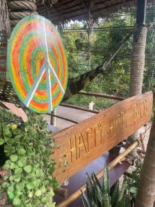 a happy little dip sign and a colorful target at Happy Hippy House2 in Ko Chang