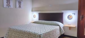 A bed or beds in a room at Donna Felì