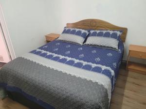 Säng eller sängar i ett rum på Hospedaje en mi casa