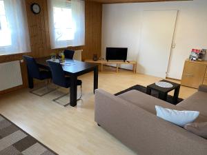 TV a/nebo společenská místnost v ubytování Ferienwohnung Rauch