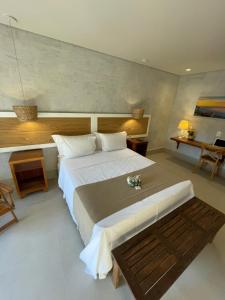 Cama ou camas em um quarto em Hiu Hotel