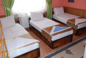Кровать или кровати в номере Aspawa Hotel