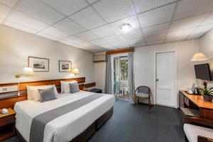 Postel nebo postele na pokoji v ubytování Forest Park Hotel + 34 fotografií