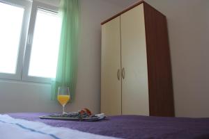 Posteľ alebo postele v izbe v ubytovaní Ruza Apartment