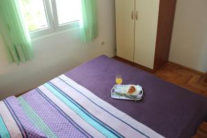Posteľ alebo postele v izbe v ubytovaní Ruza Apartment