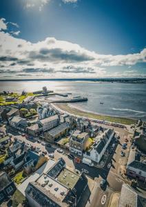 an aerial view of a city next to the water at Broughty Ferry Riverview Apt -3 bedroom -Sleeps 7 in Broughty Ferry