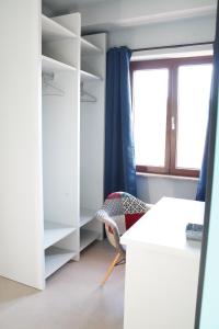 Postel nebo postele na pokoji v ubytování Rosy's Rooms