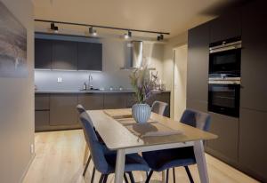 Kuchyň nebo kuchyňský kout v ubytování Staying Apt 1 - New and modern