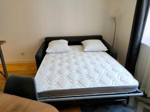 Posteľ alebo postele v izbe v ubytovaní Appartement T1bis tout confort