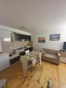Kuchyň nebo kuchyňský kout v ubytování Mila Apartment