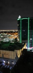 a view of a city at night with buildings at بناية يا هلا in Ajman 
