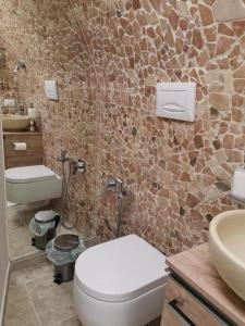 a bathroom with a toilet and a sink at Incanto in Altamura