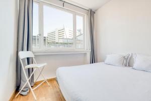 Posteľ alebo postele v izbe v ubytovaní Travel & live Santa Catarina apartment
