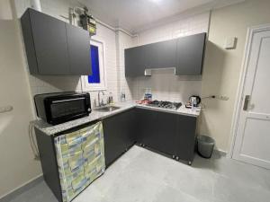 A cozinha ou cozinha compacta de New 1 Bedroom apartment in Riviera resort