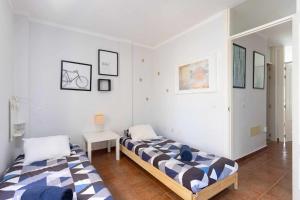 Posteľ alebo postele v izbe v ubytovaní Callao Perfect Stay by Sunkeyrents