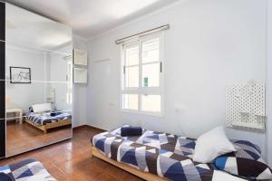 Posteľ alebo postele v izbe v ubytovaní Callao Perfect Stay by Sunkeyrents