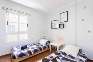 Posteľ alebo postele v izbe v ubytovaní Callao Perfect Stay by Sunkeyrents