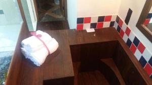 Cama ou camas em um quarto em Pousada Ribeirao da Floresta