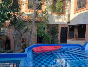 בריכת השחייה שנמצאת ב-Casa Real Cozumel או באזור