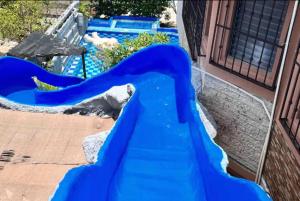 a slide at a water park at Casa Real Cozumel in Cozumel