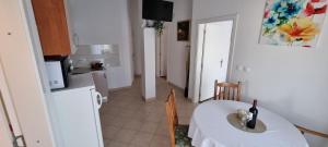 Kuchyň nebo kuchyňský kout v ubytování Apartments Ćosic