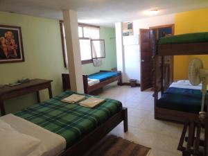 Postel nebo postele na pokoji v ubytování Hotel El Albergue Español