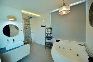Koupelna v ubytování Virawan pool kohlarn วิราวัน พูล รีสอร์ท ที่พักเกาะล้าน
