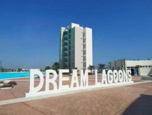 a large sign in front of a building at Paradisiaca casa con Laguna y Alberca in Veracruz