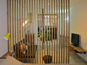 a room with a cage with a fish in it at Casa da Travessa in Lisbon +13 photos