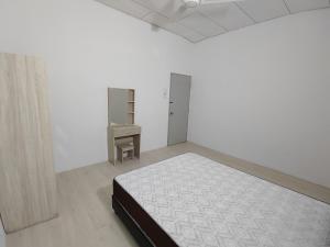 Postel nebo postele na pokoji v ubytování GP Hostel Penang