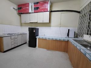 Kuchyň nebo kuchyňský kout v ubytování GP Hostel Penang
